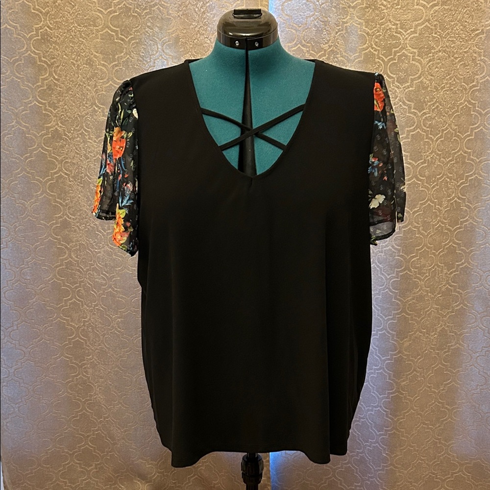 Elegant Black Blouse with Floral Accents